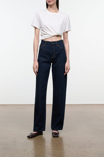 High-rise indigo jeans with wide straight leg and button closure