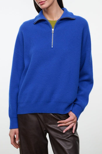Cobalt blue cashmere quarter-zip sweater with zip-up collar