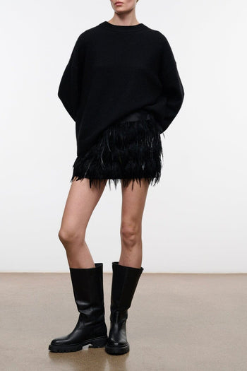 Black Moxie skirt with black feathered fringe hem, above-knee length