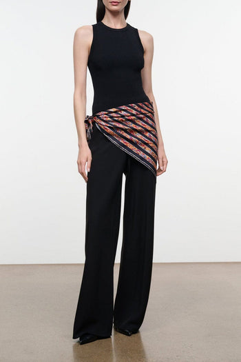 Silk scarf tied at waist, black with red and orange striped abstract pattern