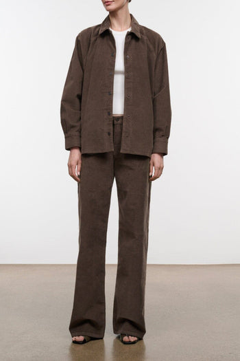 Relaxed fit brown corduroy jeans with wide straight legs and button waistband