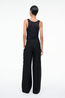 Black wide-leg trousers with smooth back and full-length relaxed fit
