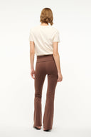 Dark brown back view pants with waistband seam and flared-leg cut