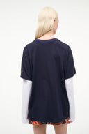 Navy T-shirt back with colorful hem panel and small sleeve graphic