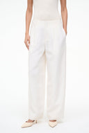 Pierre ivory wide-leg trousers close-up of waistband and front seam