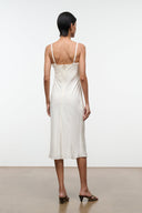 Ivory silk midi slip dress with open back and spaghetti straps