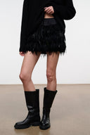 Black mini skirt with layered fringe texture and wide waistband