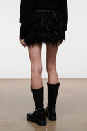 Black knee-high leather boots with thick sole and side panels