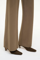 Truffle suede ankle boots with low block heel, worn with wide-leg pants