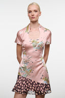 Pink silk dress with scoop neckline, short sleeves, multicolor floral print, tiered hem