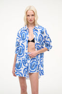 Women’s blue-and-white patterned button-front top with quarter sleeves, relaxed fit