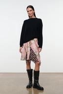 Silk skirt with multicolor floral tapestry print on dusty pink base, knee-length ruffle