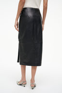 Black leather wrap midi skirt, front view with side slit