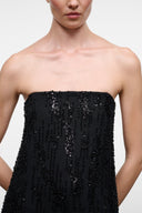 Black strapless sequin dress with vertical bead fringe detail