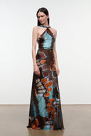 Silk halter maxi dress with abstract butterfly print, sleeveless, halter neckline tie