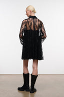 Black sequin mini dress, sheer back with high ruffled neck
