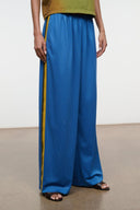 Blue wide-leg pants with elastic waist and yellow side stripe, full length