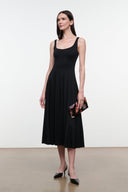 Black snake-texture slingback pumps with pointed toe and slender stiletto heel