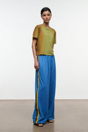 Blue wide-leg pants with elastic waistband and yellow side stripe