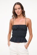 Black smocked peplum cami top with thin spaghetti straps