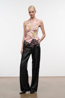 Pink silk halter top with multi-color print, draped neckline and ruffled hem