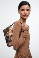 Brown and black speckled haircalf shoulder bag with top handle and flap, side view