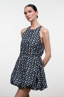 Navy sleeveless mini dress with allover teardrop print and gathered waist