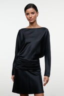 Black silk mini dress close-up, long sleeves and ruched waist gathering