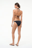 Black bikini bottom with metal-stud waistband trim, low-rise