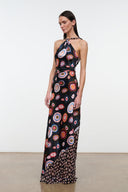 Silk halter maxi dress with multicolor circular motifs on dark background