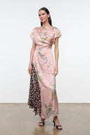 Pink floral long dress with short flutter sleeves and fitted silhouette.