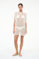 Ivory open-knit coverup dress with orange horizontal stripes, short tunic silhouette.