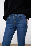 Women's stone blue stretch flare jeans, button-and-zip front with belt loops