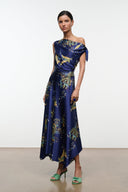 Navy silk midi dress with gathered off-shoulder neckline and gold tapestry motifs