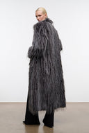 Long shaggy fur coat, dark charcoal and gray, side view