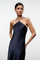 Navy halter satin maxi dress with beaded neckline, sleeveless silhouette
