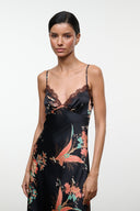 Black silk dress with floral print, lace-trim V neckline, spaghetti straps (front)