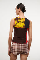 Back view of sleeveless Primo top with yellow floral panel, dark brown body, red side stripe