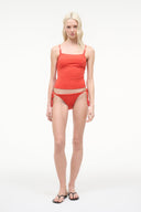Red tankini top with adjustable spaghetti straps and ruched front