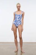 Blue toile one-piece swimsuit with thin straps and square neckline