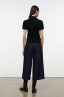 Hunter indigo denim culotte jeans, back view with wide cuffed hem and patch pockets