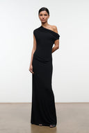 Black one-shoulder draped maxi dress, sleeveless, side view with floor-length skirt
