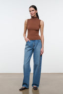 Brown sleeveless mock-neck knit top with ribbed texture, full-length view