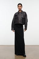 Distressed brown leather jacket with stand collar, zip front, and flap chest pockets