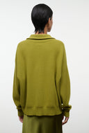 HUDSON cashmere sweater, back view with ribbed hem and cuffs, pear green