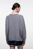 Ash gray cashmere crewneck sweater, back view; ribbed cuffs and hem