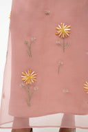 Pink sheer hem panel with colorful daisy embroidery, subtle stitching and sparkly details