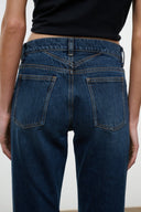 Mid-rise flare jeans with back yoke and two patch pockets, stitched detailing