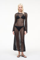 Black mesh maxi dress with long sleeves, geometric pattern, and V-front panel