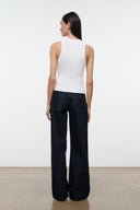 Indigo wide-leg jeans, back view, relaxed straight leg with centered back seam.
